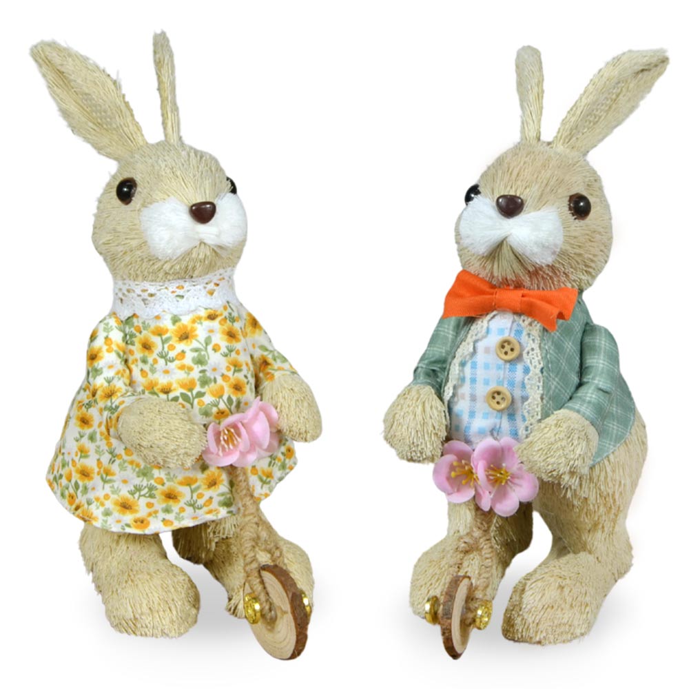 Coppia coniglietti decorativi con bicicletta h 24 cm.