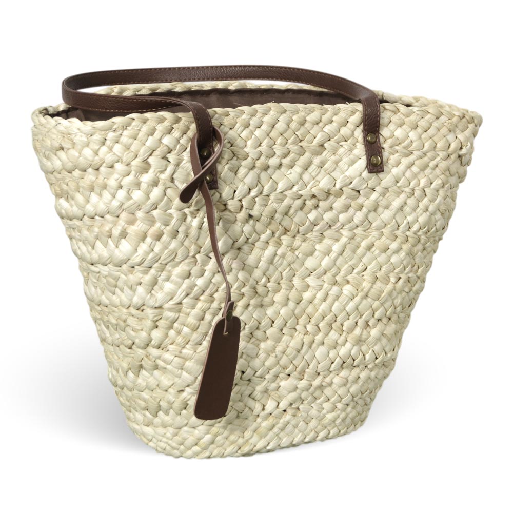 Borsa mare erba sun in paglia naturale intrecciata con manici in cuoio marrone.
